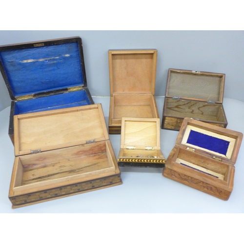 768 - Six boxes; three inlaid wooden boxes, an oriental carved wooden box, a metal inlaid box and one othe... 