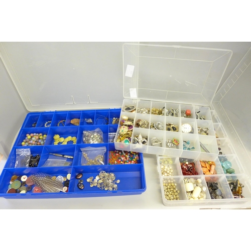 782 - Three plastic tubs of jewellery findings