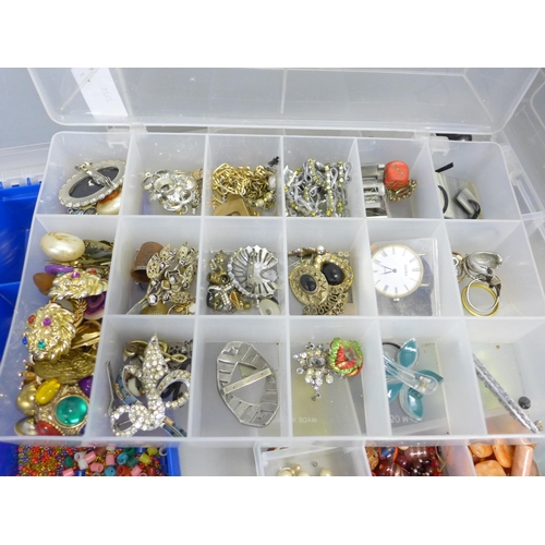 782 - Three plastic tubs of jewellery findings