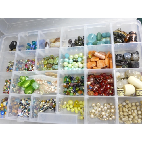 782 - Three plastic tubs of jewellery findings