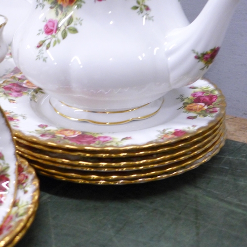 796 - A Royal Albert Old Country Roses six setting tea service plus sandwich plates, etc. **PLEASE NOTE TH... 