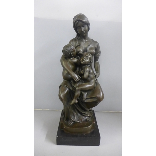 811 - A bronze sculpture, after Paul Dubois, La Norice on a slate base, 45cm