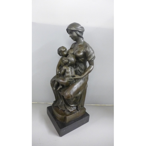 811 - A bronze sculpture, after Paul Dubois, La Norice on a slate base, 45cm