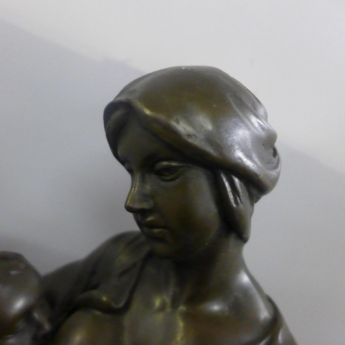 811 - A bronze sculpture, after Paul Dubois, La Norice on a slate base, 45cm