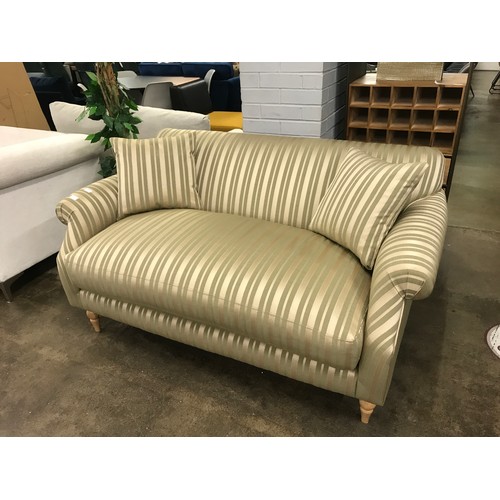 1454 - A green and gold striped upholstered two seater sofa