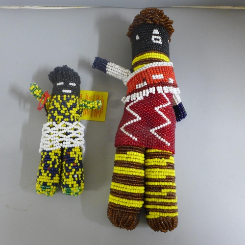 814 - Tribal art; six South African beaded dolls