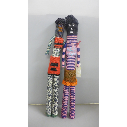 814 - Tribal art; six South African beaded dolls