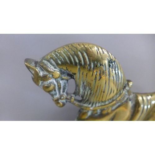 822 - A pair of brass horse fire dogs/door stops