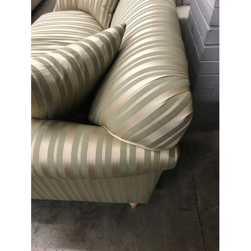 1454 - A green and gold striped upholstered two seater sofa