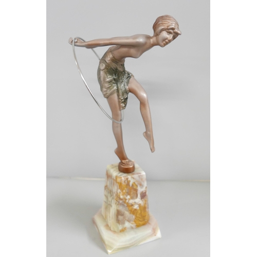 826A - An Art Deco style figure, Hoop Girl, after, F. Preiss, on an onyx base, 30.5cm