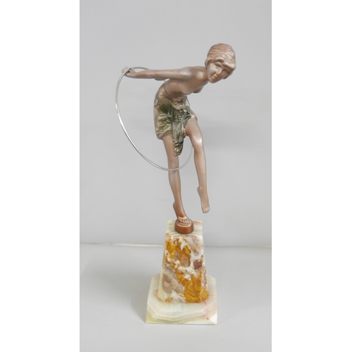 826A - An Art Deco style figure, Hoop Girl, after, F. Preiss, on an onyx base, 30.5cm