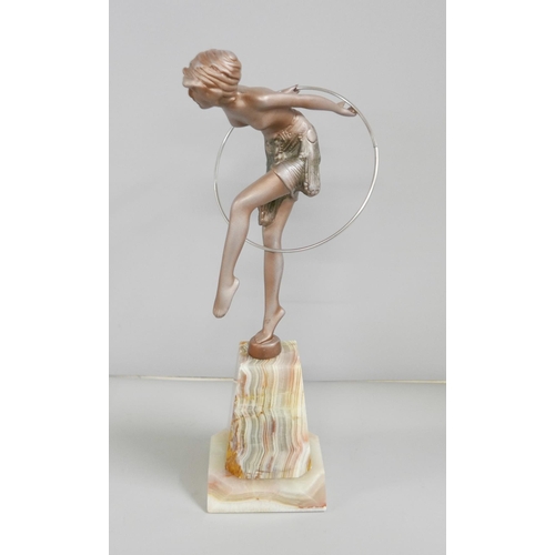 826A - An Art Deco style figure, Hoop Girl, after, F. Preiss, on an onyx base, 30.5cm