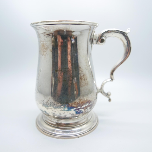 854 - A George III silver tankard, London 1767, by William and James Priest with later engraving, double s... 