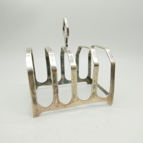 861 - A silver toast rack, 63.8g