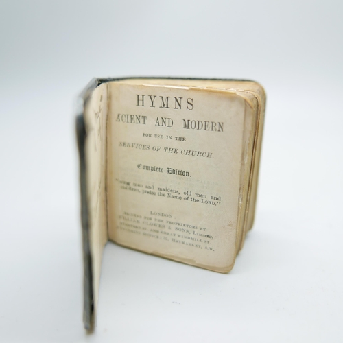 863 - A Hymn book and a Prayer book, both with silver covers and Reynolds Angels detail