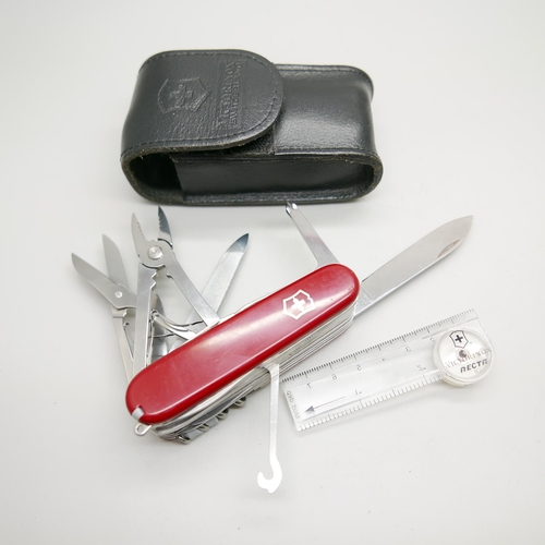 877 - A Victorinox Swiss multi-tool knife, 22 tools and with a compass, with leather case