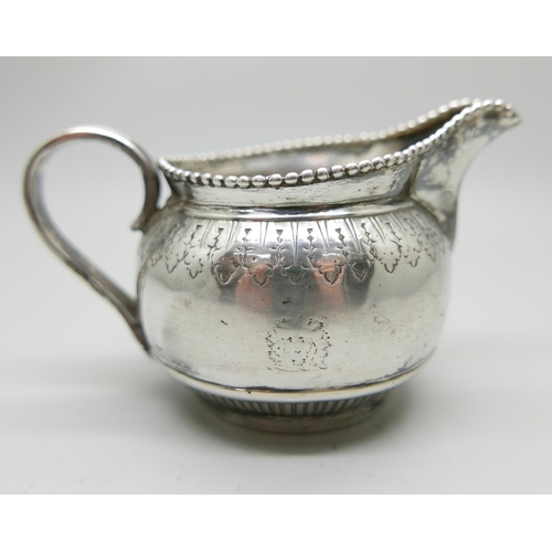 883 - A Victorian silver jug, London 1878, 100g