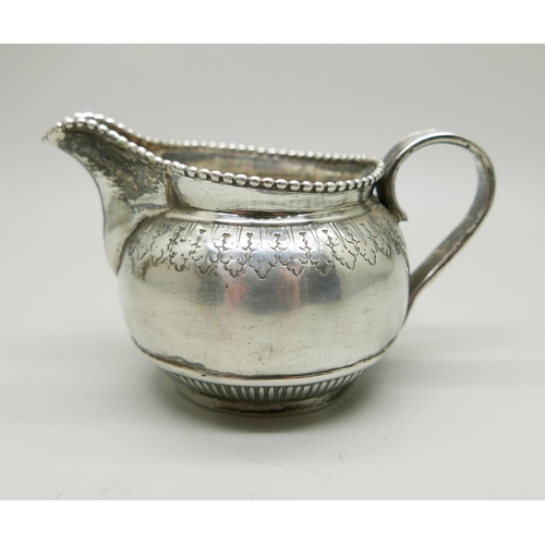 883 - A Victorian silver jug, London 1878, 100g