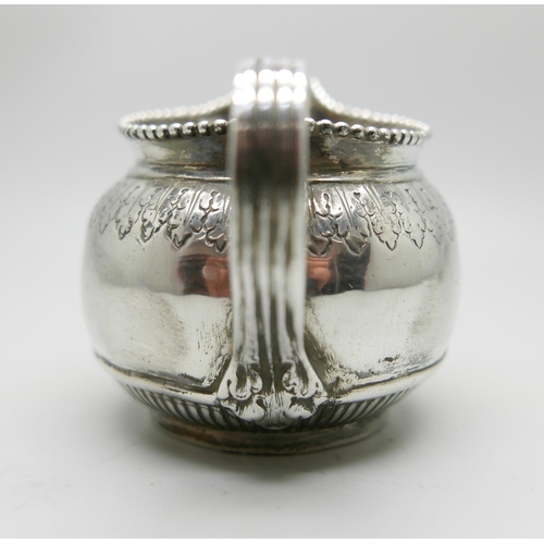 883 - A Victorian silver jug, London 1878, 100g