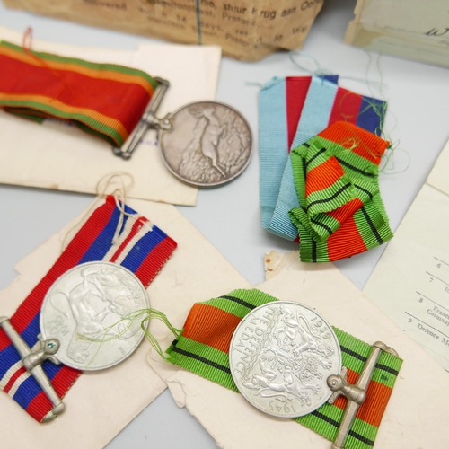 886 - A set of WWII medals including Africa Service Medal to 543697 W.F. Appel, with paperwork and envelop... 