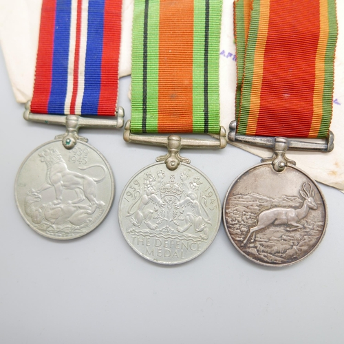 886 - A set of WWII medals including Africa Service Medal to 543697 W.F. Appel, with paperwork and envelop... 