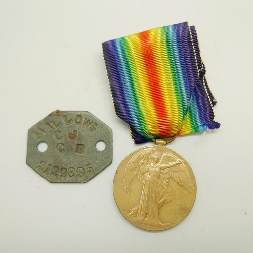 894 - A WWI Victory Medal, 241092 Pte. H.C. Naylor Northumberland Fusiliers, and a dog tag, Mallows 212989... 