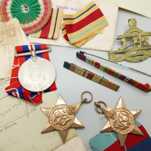 903 - Assorted WWII medals, etc., including four to 21777 K.J. Hanssen with original address envelope