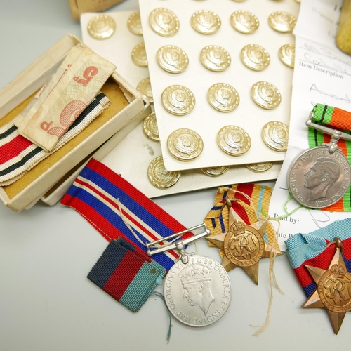 904 - A WWI Christmas tin, WWII medals, etc.