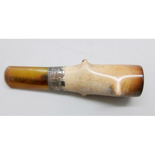 941 - Three carved Meerschaum pipes, cased