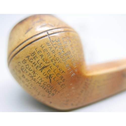 942 - An early 20th Century Meerschaum pipe, missing end of amber stem, carved with fifty-two different lo... 