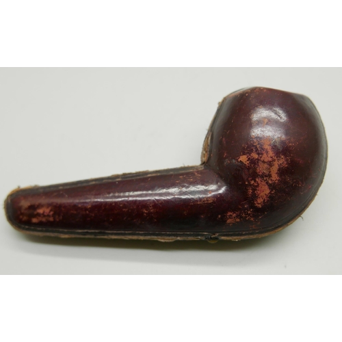 942 - An early 20th Century Meerschaum pipe, missing end of amber stem, carved with fifty-two different lo... 