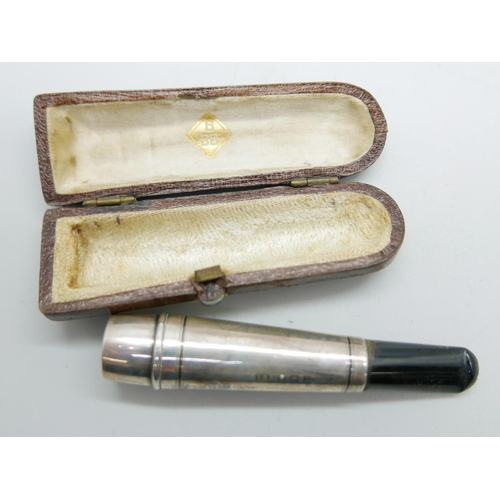 947 - A silver cheroot holder with extendable stem, cased