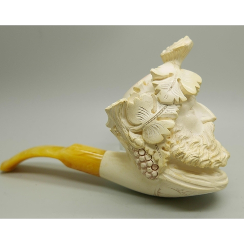 949 - A large carved Meerschaum pipe of a Greek God, cased