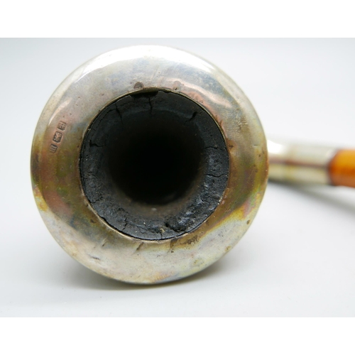 950 - Two Calabash pipes with silver mounts and amber stems, cased