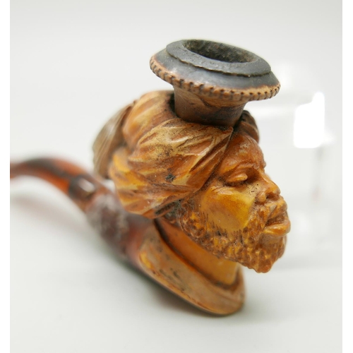 952 - Two carved Meerschaum pipes, one with head of an African man and one of a Greek god