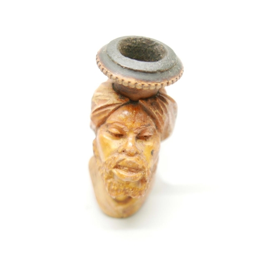 952 - Two carved Meerschaum pipes, one with head of an African man and one of a Greek god