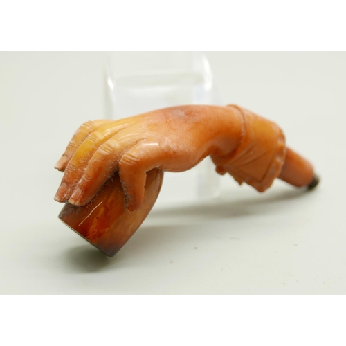 955 - Two hand carved Meerschaum pipes in the form of a lady's hand in glove, the larger pipe with broken ... 