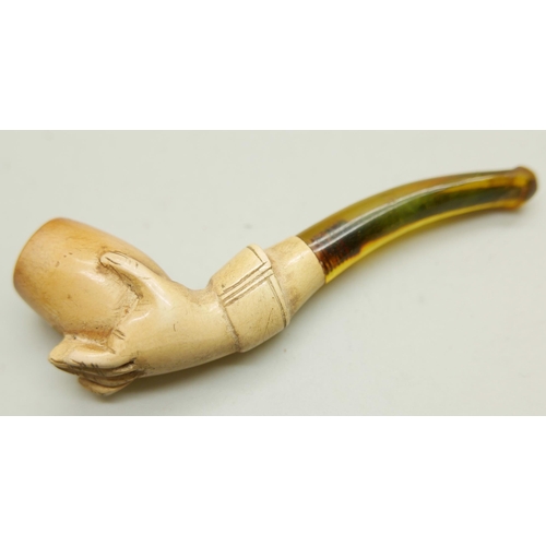 955 - Two hand carved Meerschaum pipes in the form of a lady's hand in glove, the larger pipe with broken ... 