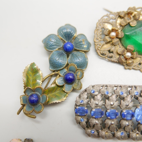 991 - A collection of brooches, (one a/f)