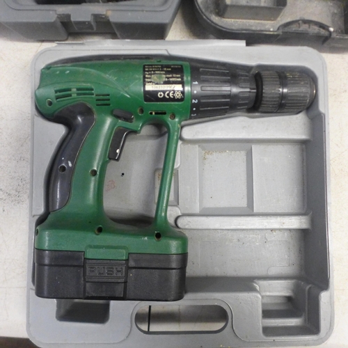 2009 - Five assorted cased drills including a Toledo TCD-240012 24v cordless power drill and a Fern power d... 