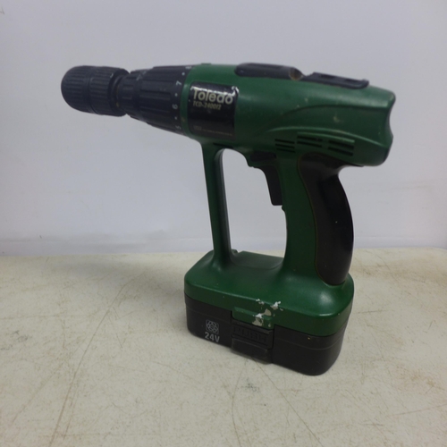 2009 - Five assorted cased drills including a Toledo TCD-240012 24v cordless power drill and a Fern power d... 