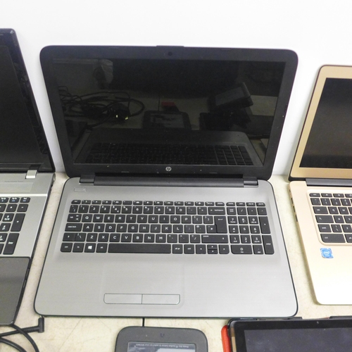 2074 - A box of laptops including HP, Acer, Chromebook, Acer tablet, and Amazon Kindle and one other E-read... 