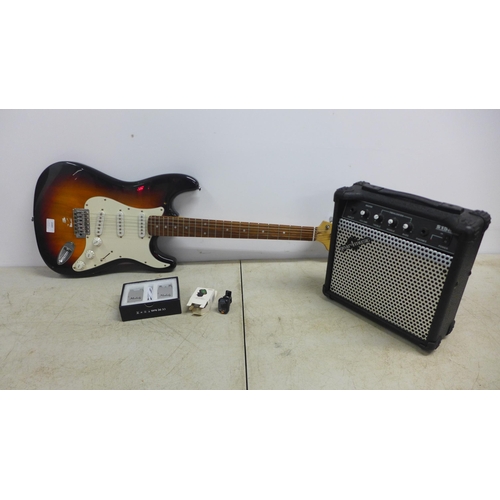 2089 - A Boston Strat style Sunburst electric guitar, a Gear 4 Music S15A 15w acoustic amplifier, an  Airbr... 