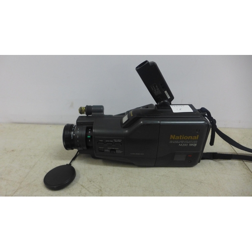 2092 - A National NV-M200EN VHSC video camera and battery pack