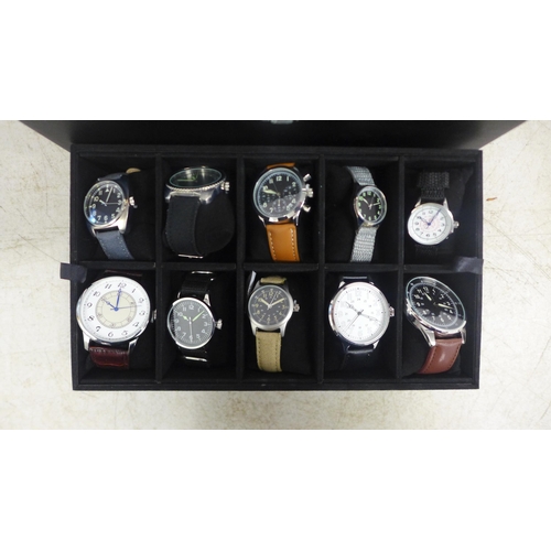 2102 - A display box containing gentleman's wristwatches (20 per box)