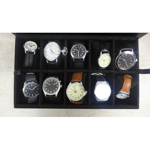 2103 - A display box containing gentleman's wristwatches (20 per box)