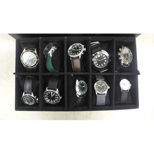 2105 - A display box containing gentleman's wristwatches (20 per box)