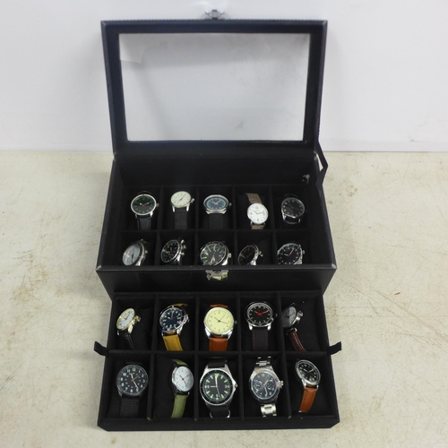 2106 - A display box containing gentleman's wristwatches (20 per box)