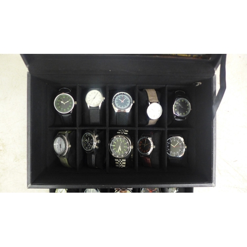 2106 - A display box containing gentleman's wristwatches (20 per box)