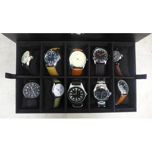 2106 - A display box containing gentleman's wristwatches (20 per box)